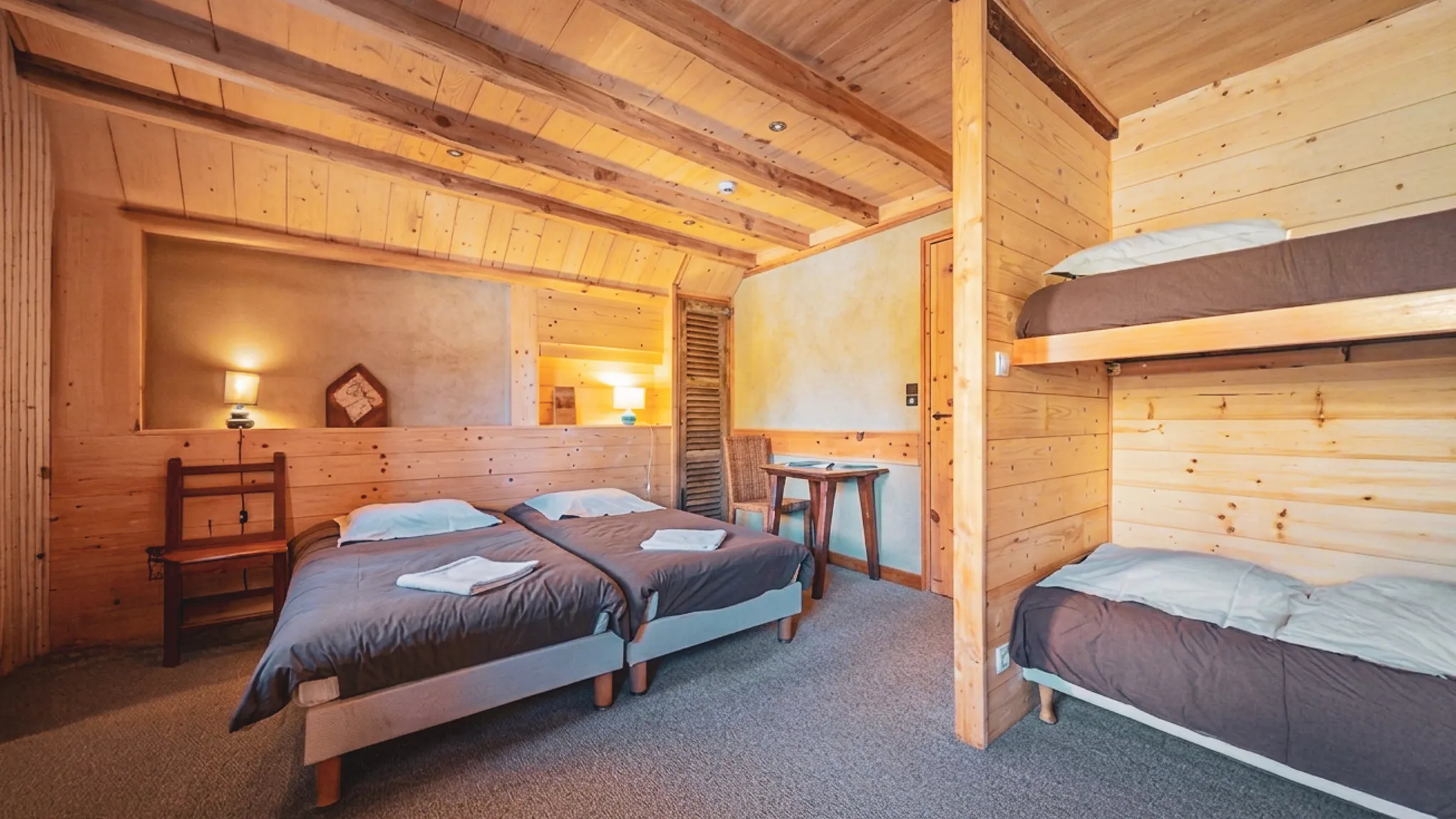 A typical shared room in a Queyras hut or gîte, for evening recovery.